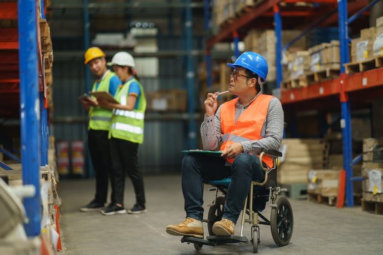 Warehouse worker in wheelchair