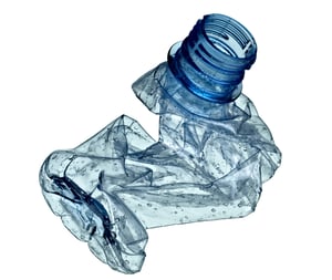 close up of an empty used plastic bottle on white background with clipping path