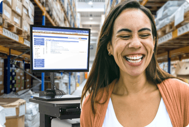 Lady smiling next to workstation