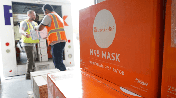 workers-unloading-n95-mask-shipment