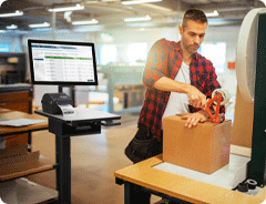 worker next to a cart