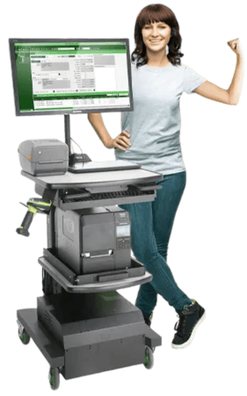 Lady flexing next to a workstation